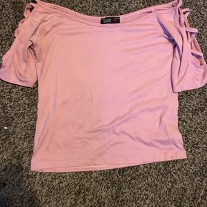 This is a pink short sleeved shirt.